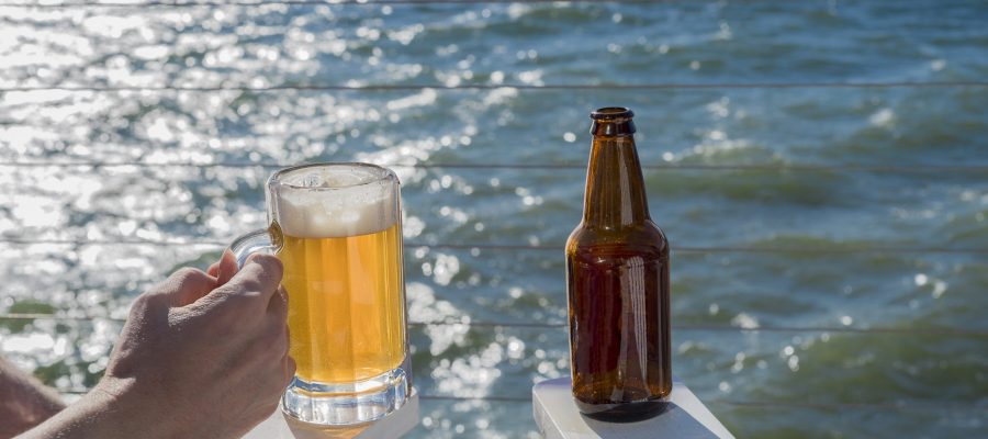 fresh-poured-mug-of-beer-while-relaxing-on-seaside-2023-11-27-05-13-15-utc